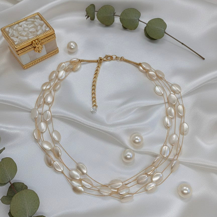 Multi-Strand Coin Shaped Pearl Necklace